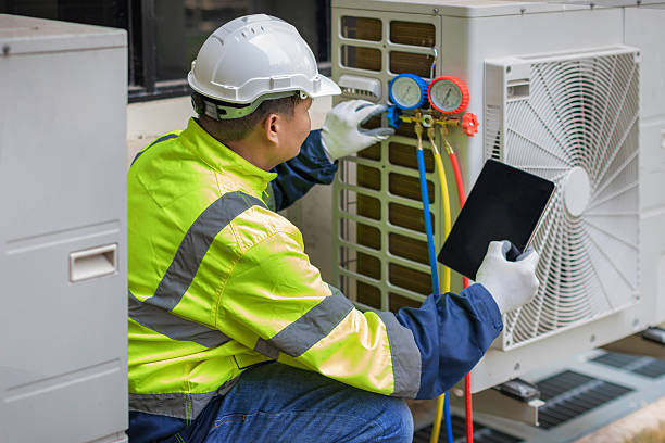 Professional Air Conditioning Repair technician working in Marshall, MI